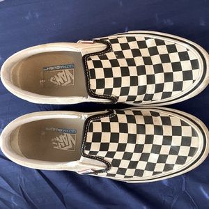 Black and white checkered VANS, size 7.5 in mens, 9 in womens